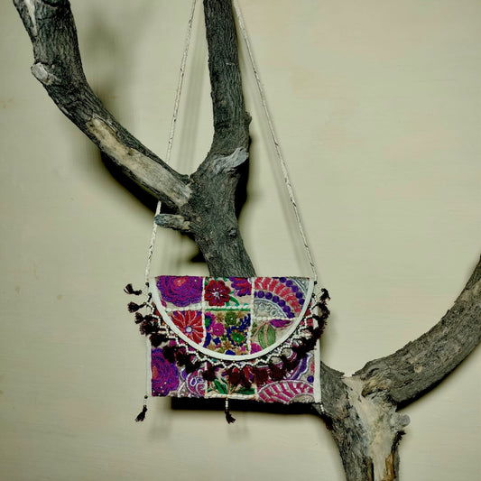 Patchwork sling bags available