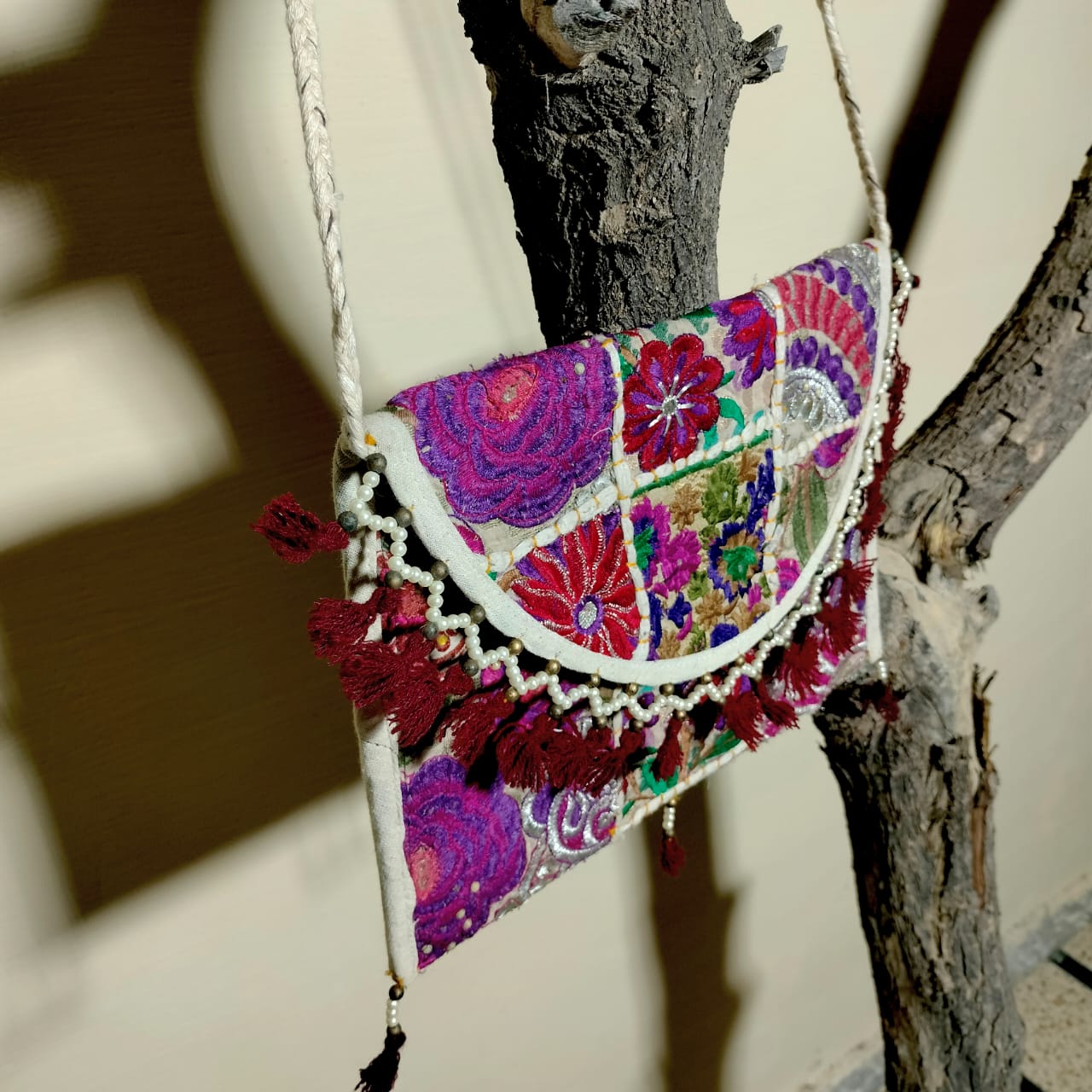 Patchwork sling bags available