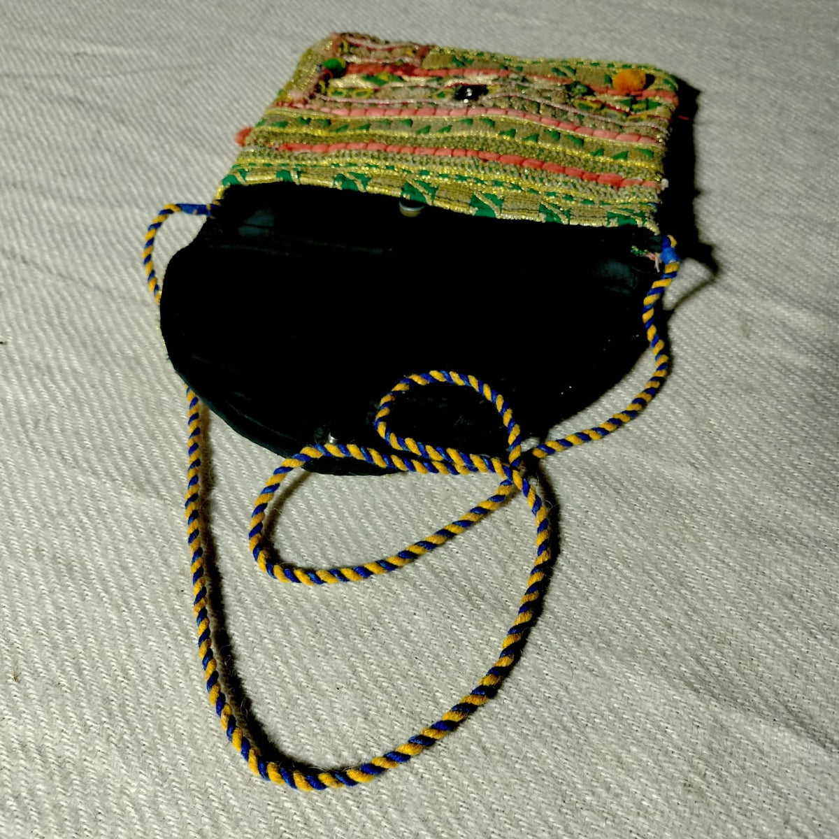 Handcrafted sling bags