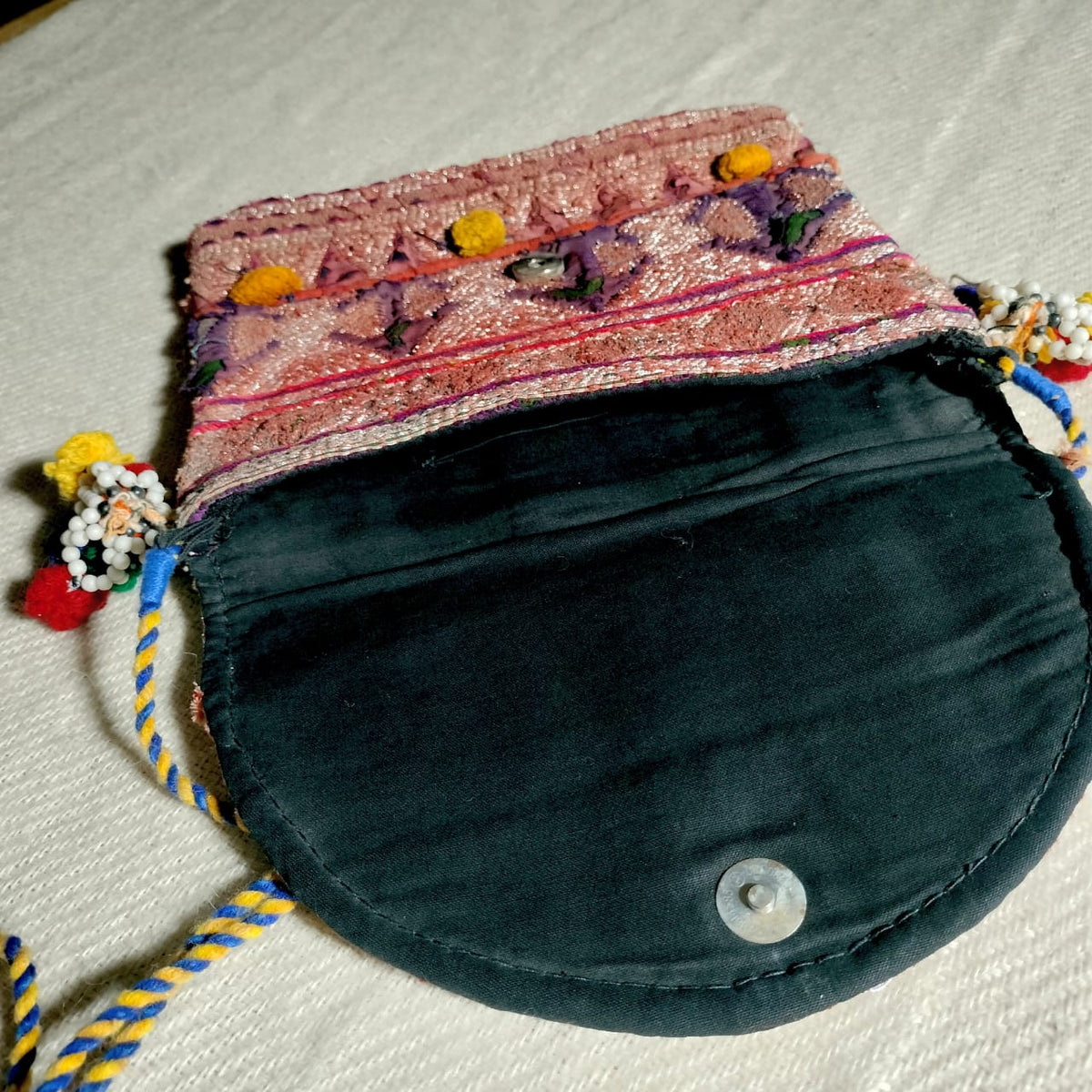 Handcrafted sling bags
