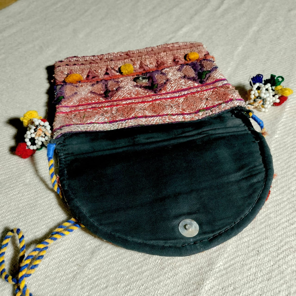 Handcrafted sling bags