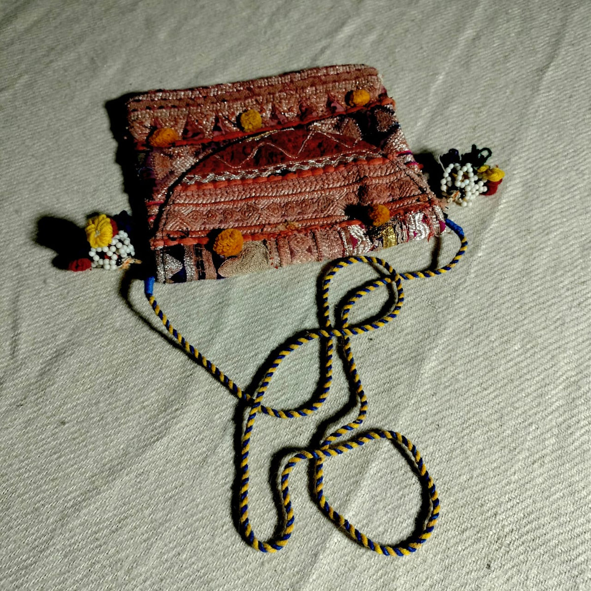 Handcrafted sling bags