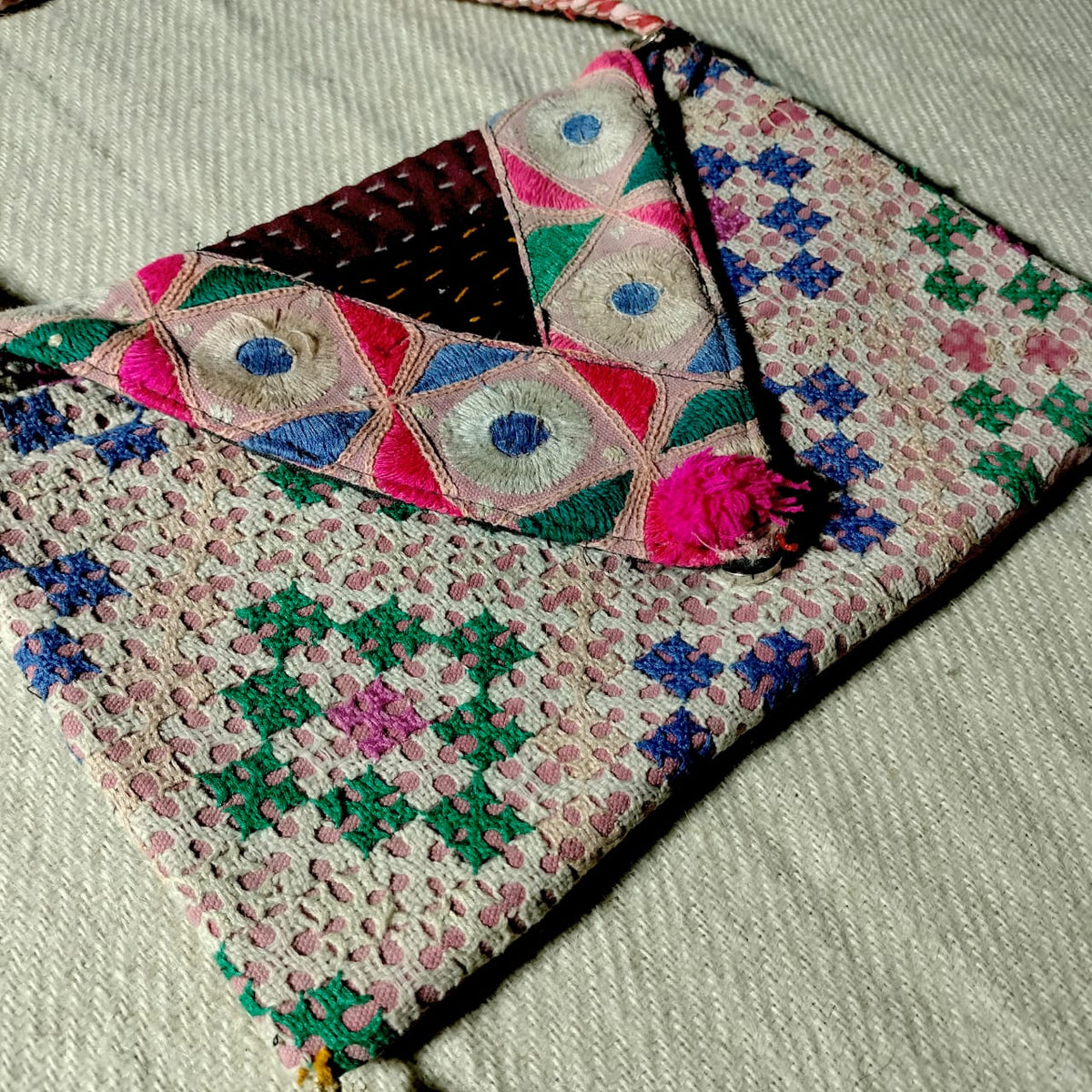 Embroidered sling bag