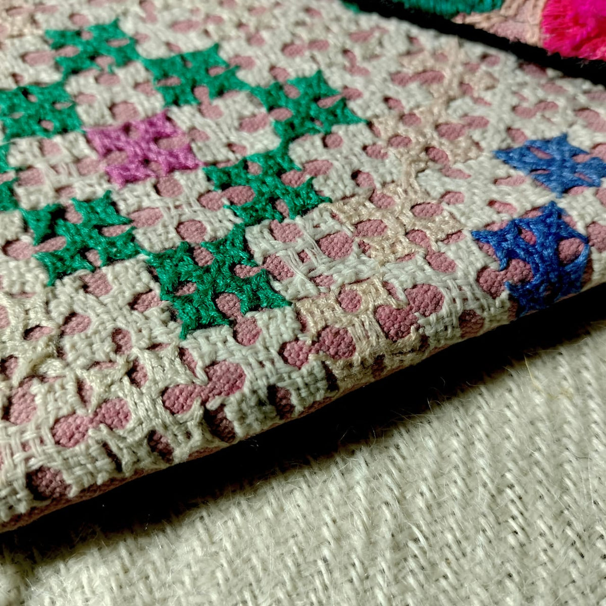 Embroidered sling bag