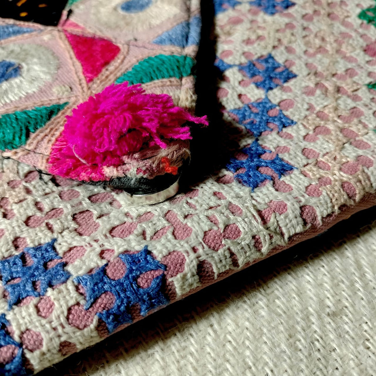 Embroidered sling bag