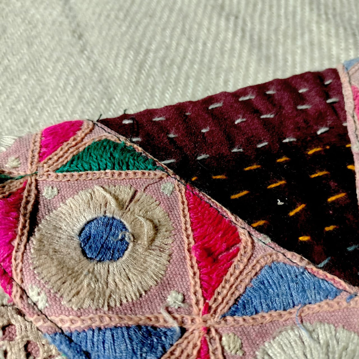 Embroidered sling bag