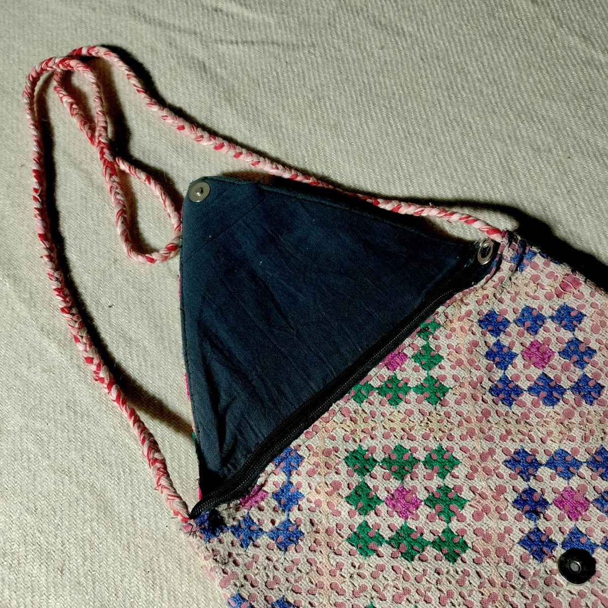Embroidered sling bag