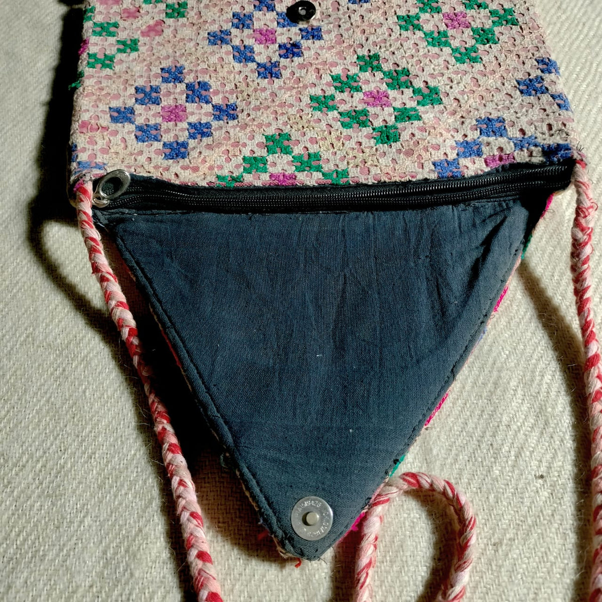 Embroidered sling bag