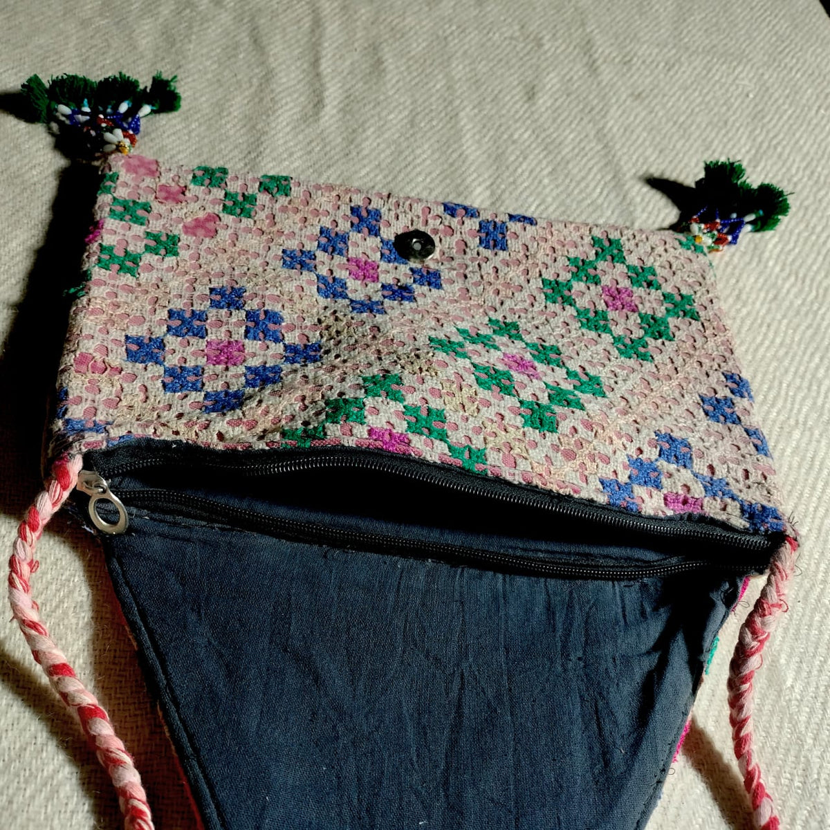 Embroidered sling bag