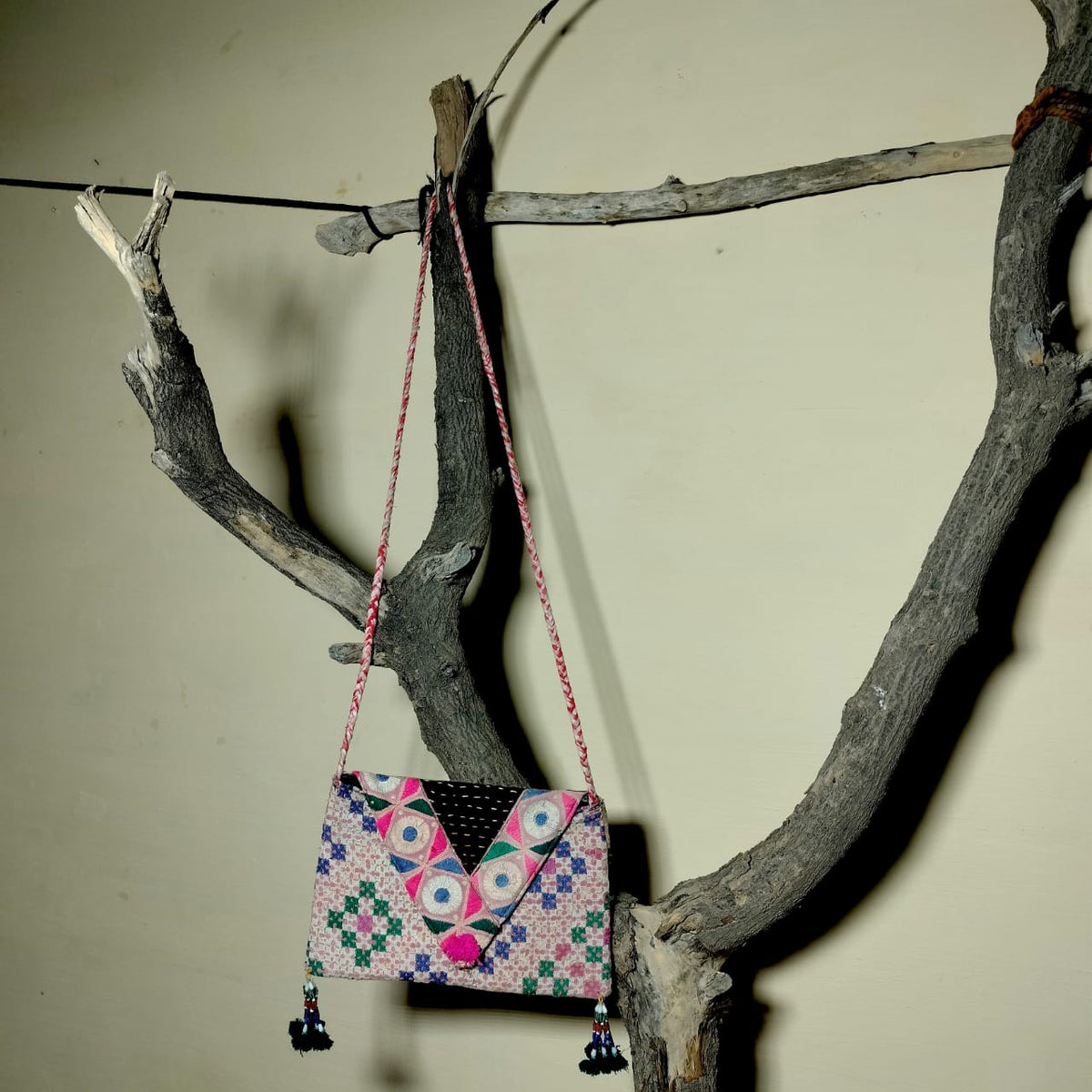 Embroidered sling bag