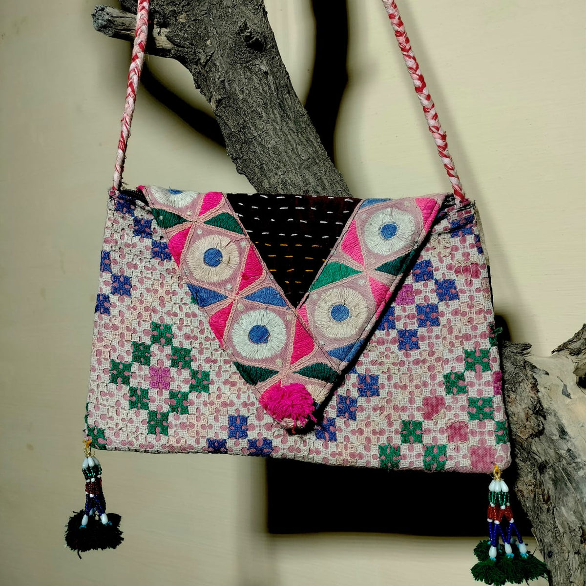 Embroidered sling bag