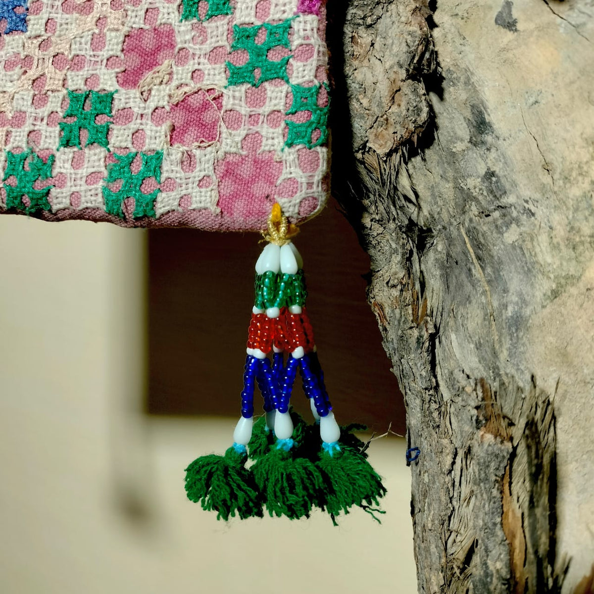 Embroidered sling bag
