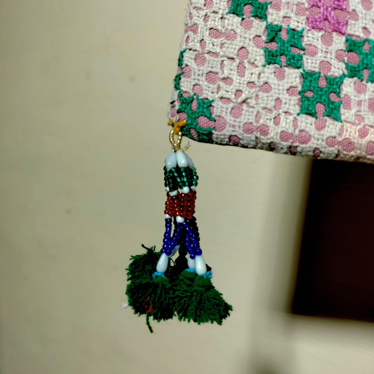 Embroidered sling bag