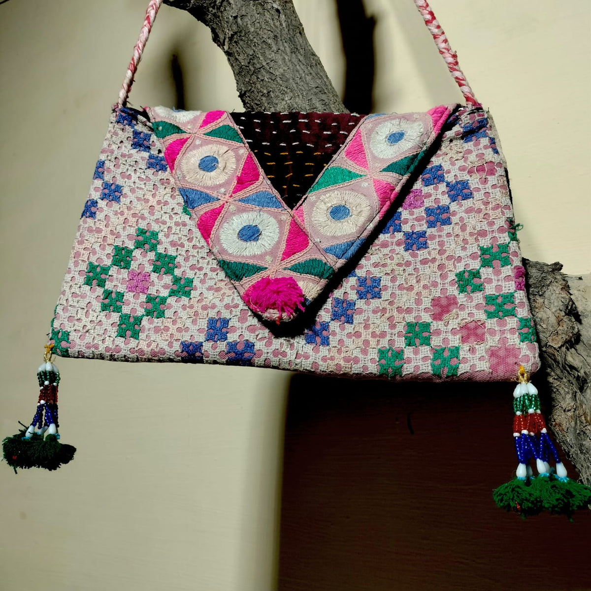 Embroidered sling bag