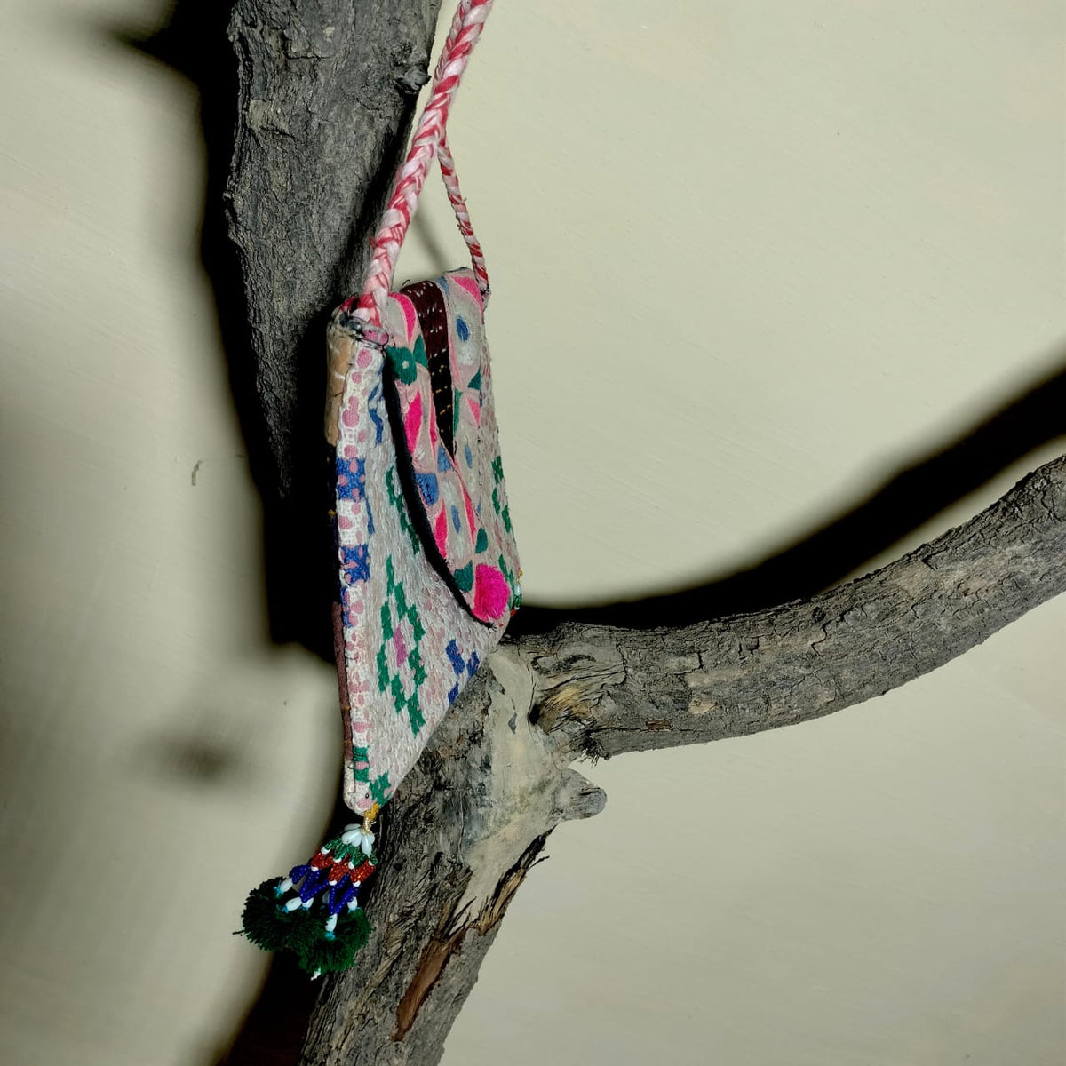 Embroidered sling bag